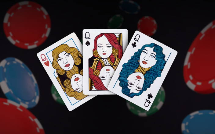 Three queen cards and poker chips (preview)
