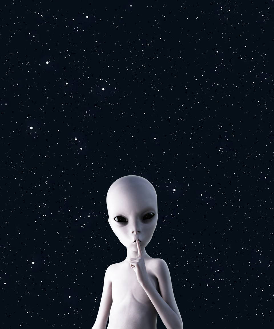 An alien gesturing to be quiet for Confetti's Halloween Taboo (Small)