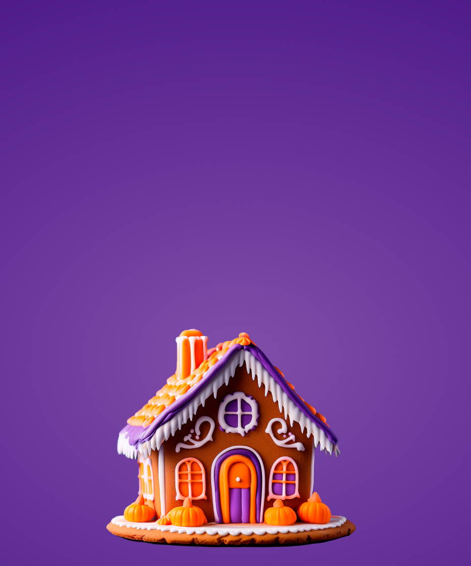 Green and purple frosted gingerbread house with Halloween decorations (small)