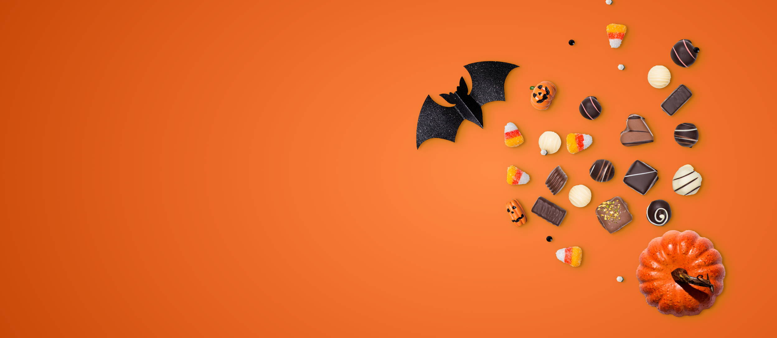 Assortment of chocolates and Halloween decorations (large)