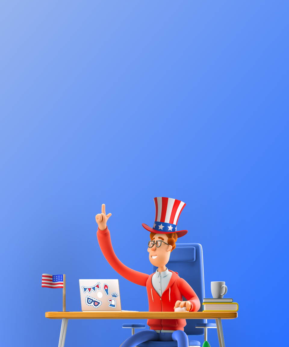 An employee sitting in front of their computer decorated in patriotic stickers, wearing a patriotic hat and hoodie, at a desk with an American Flag for Confetti's Virtual American History Trivia
