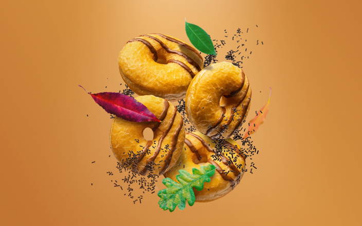 Flying donuts with leaves and sprinkles