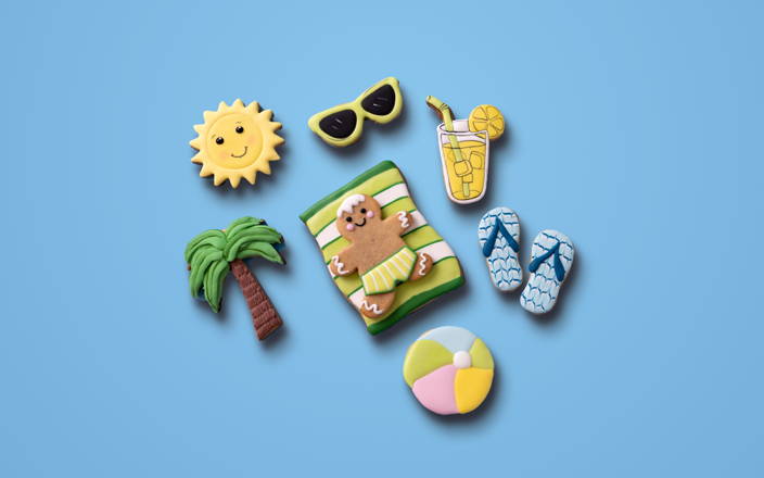 Cookies in summer shapes like flip flops, beach balls, sunglasses, the sun, and more for Confetti's Summer Cookie Decorating (Preview)