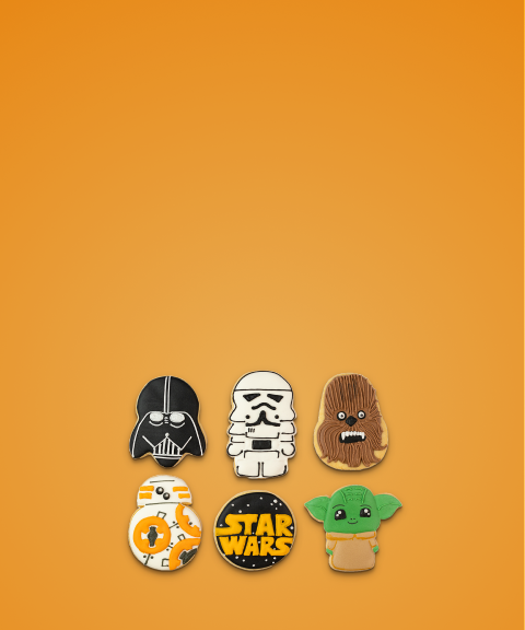 Cookies iced like different characters from the Star Wars franchise for Confetti's Virtual Star Wars Cookie Decorating