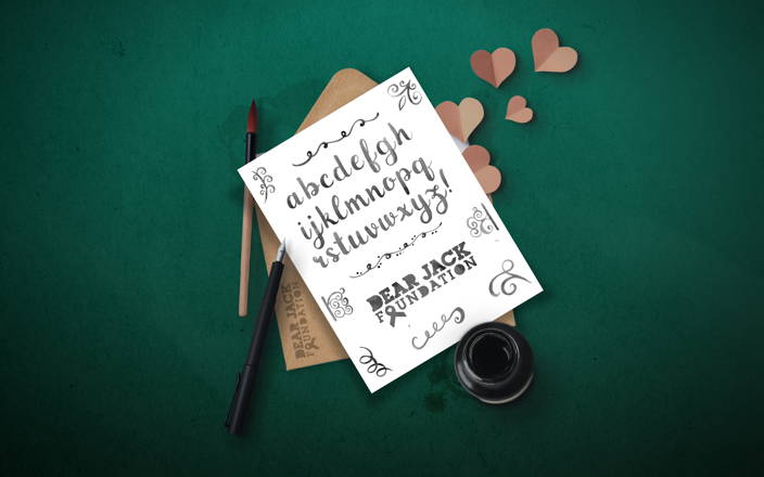 Paper and envelope with hand drawn calligraphy and hearts (preview)