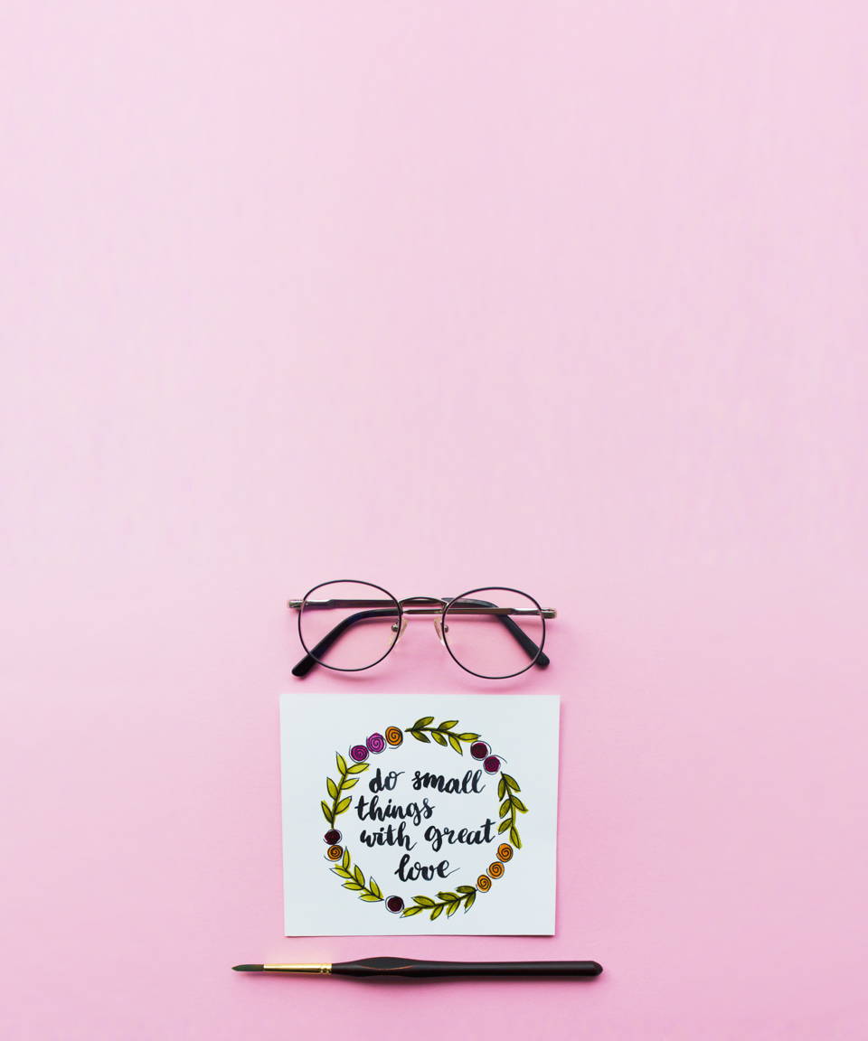 Glasses, a pen, and a card from a BYO Hand Lettering Class (small)