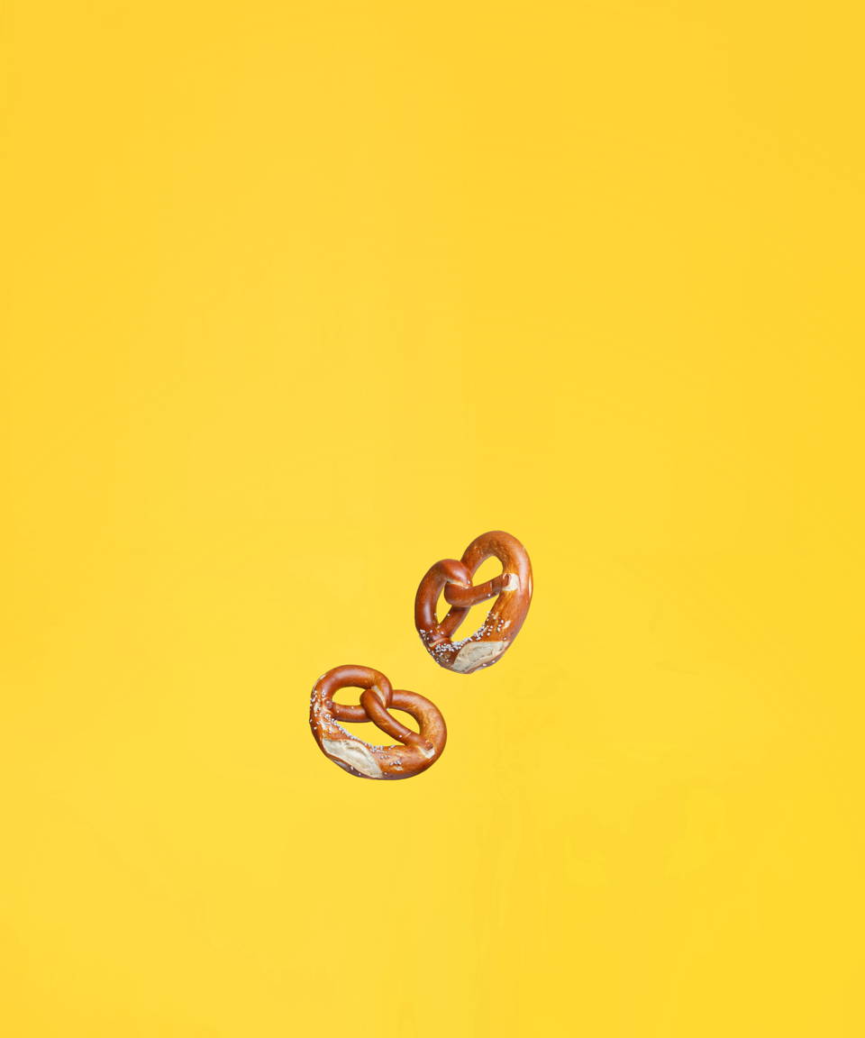Two soft baked pretzels for Confetti's Virtual BYO Pretzel Making Class
