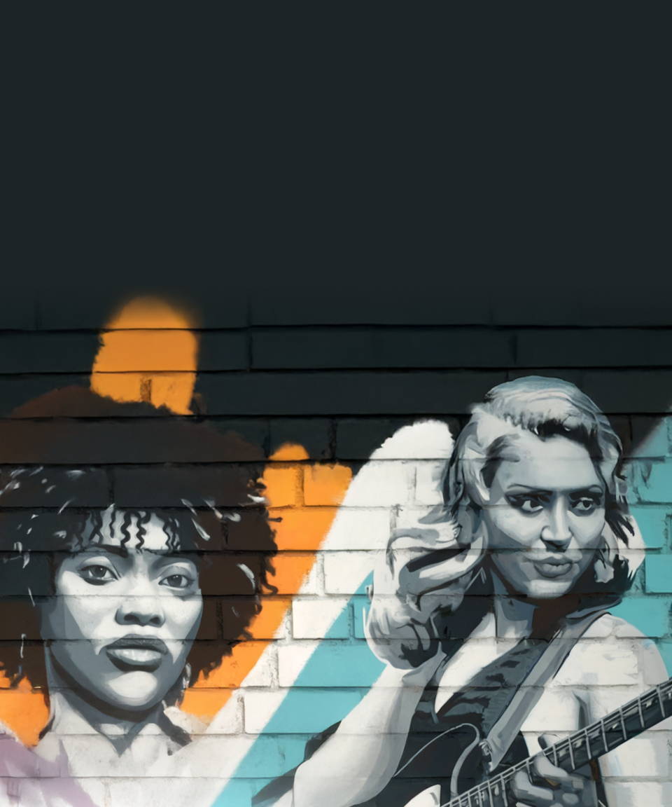 Women musicians graffiti on wall