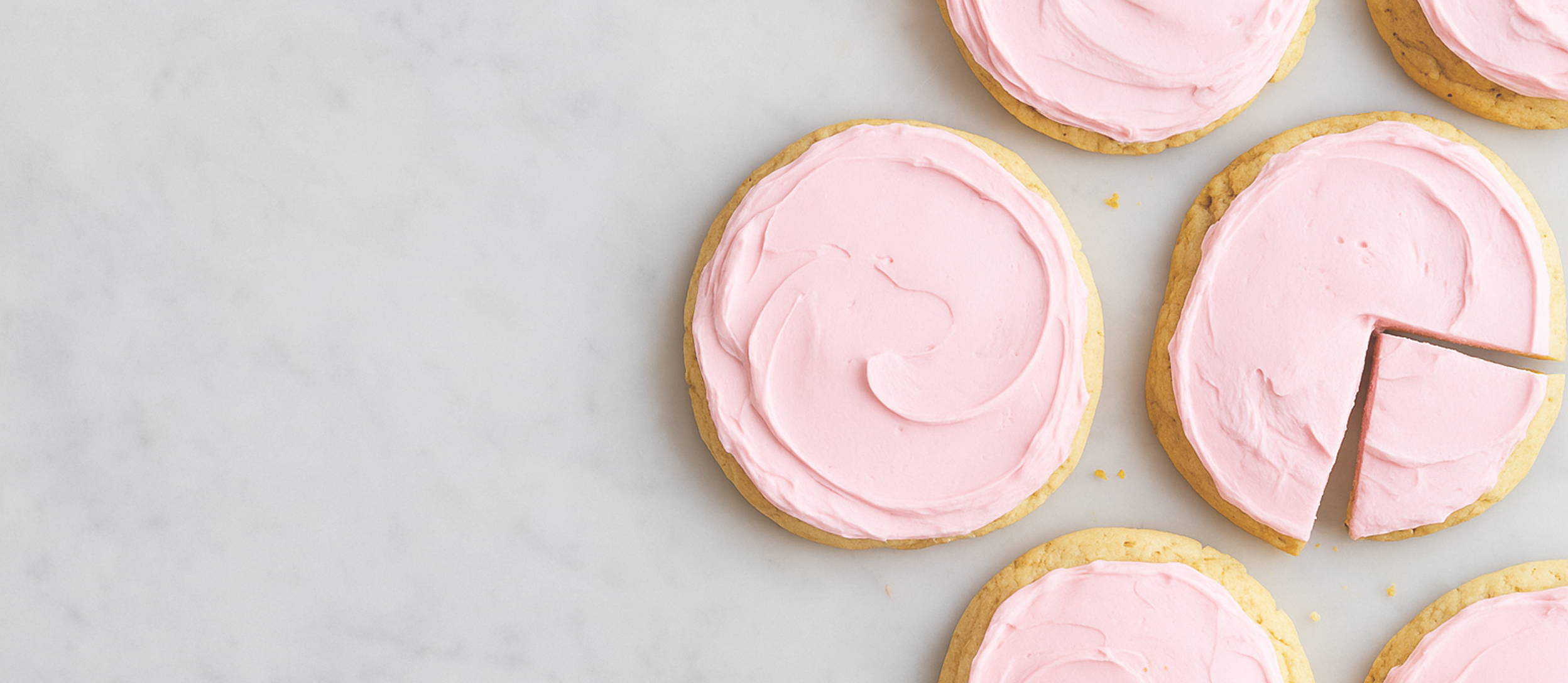 Image of sugar cookies with pink frosting