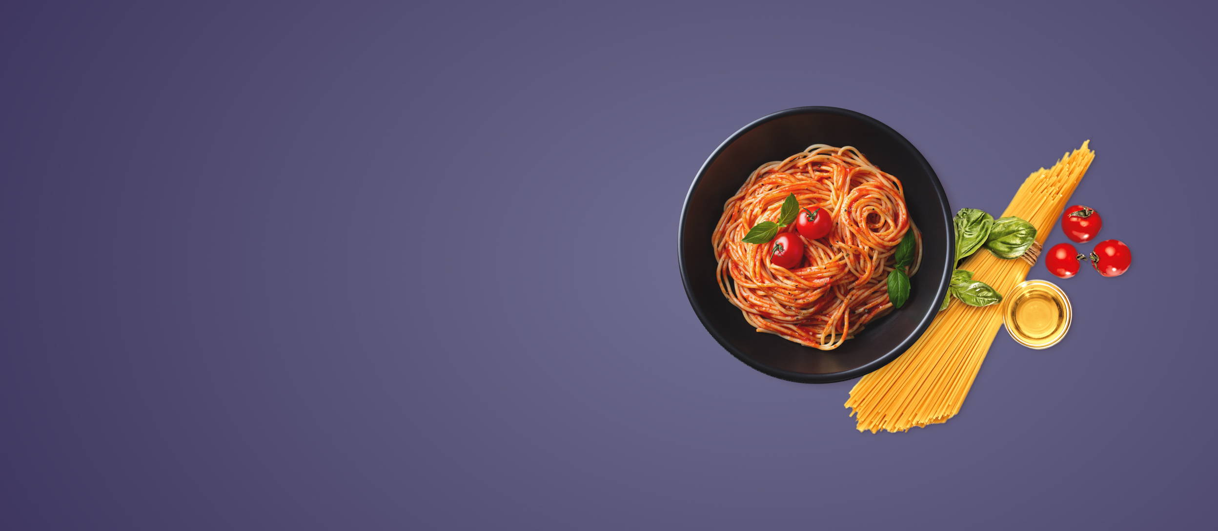 A plate of spaghetti next to a bundle of pasta, basil, and tomatoes for Confetti's Virtual Cooking Workshop