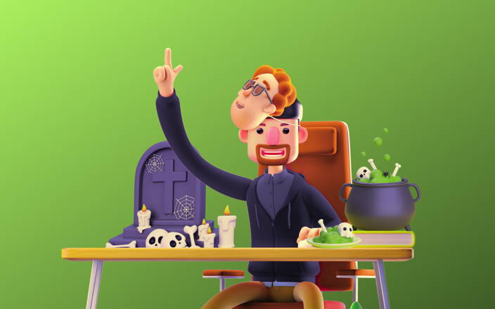 An employee wearing a mask sitting at their desk decorated with spooky Halloween decorations for Confetti's Virtual Fibbage Game Online