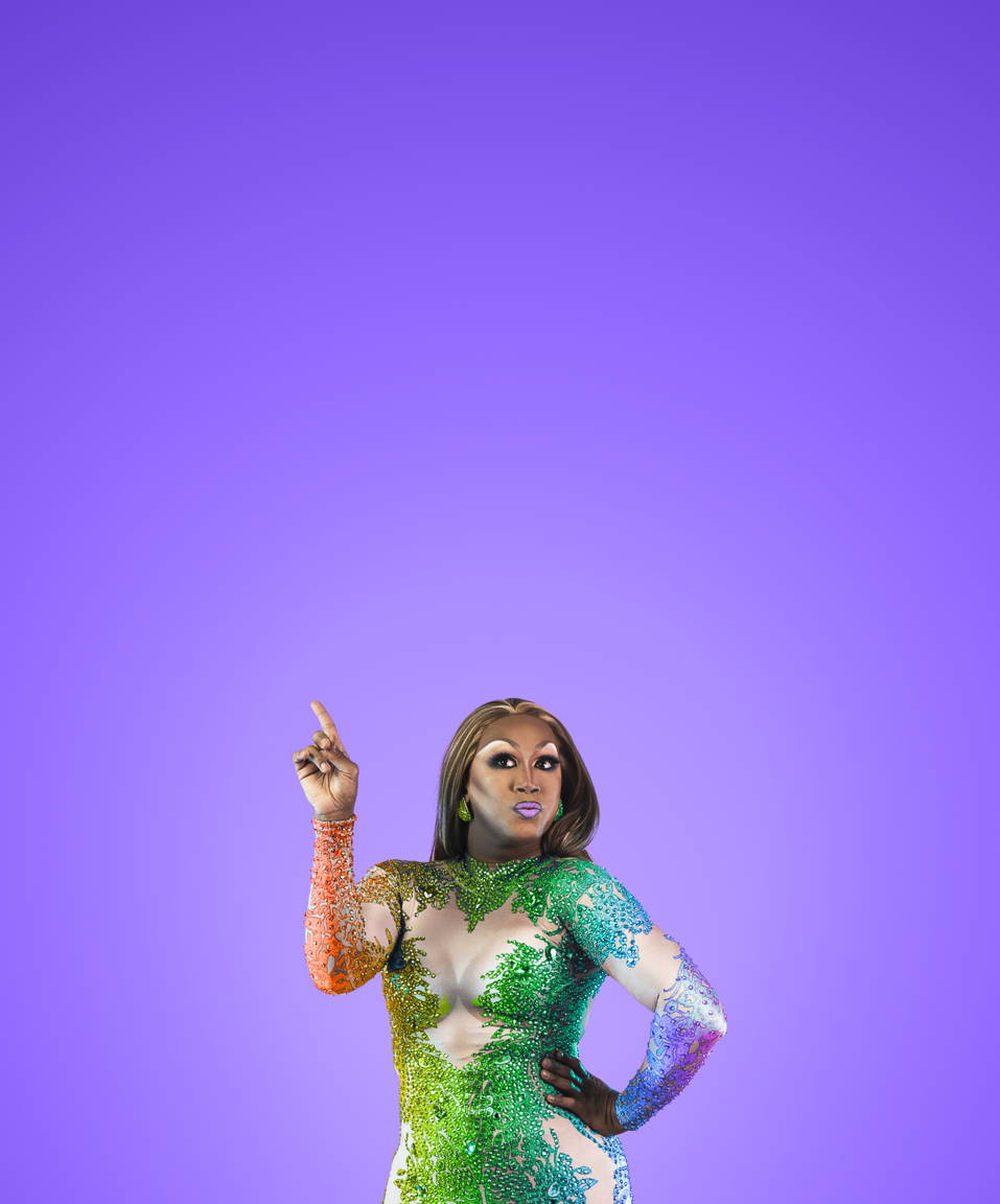 Drag queen pointing and posing with arm on hip (small)