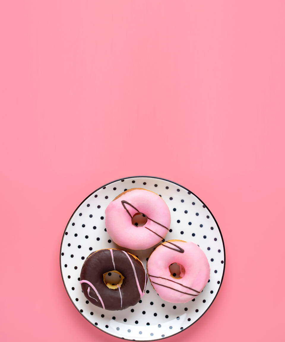 Strawberry and chocolate glazed donuts on polka dot plate (small)