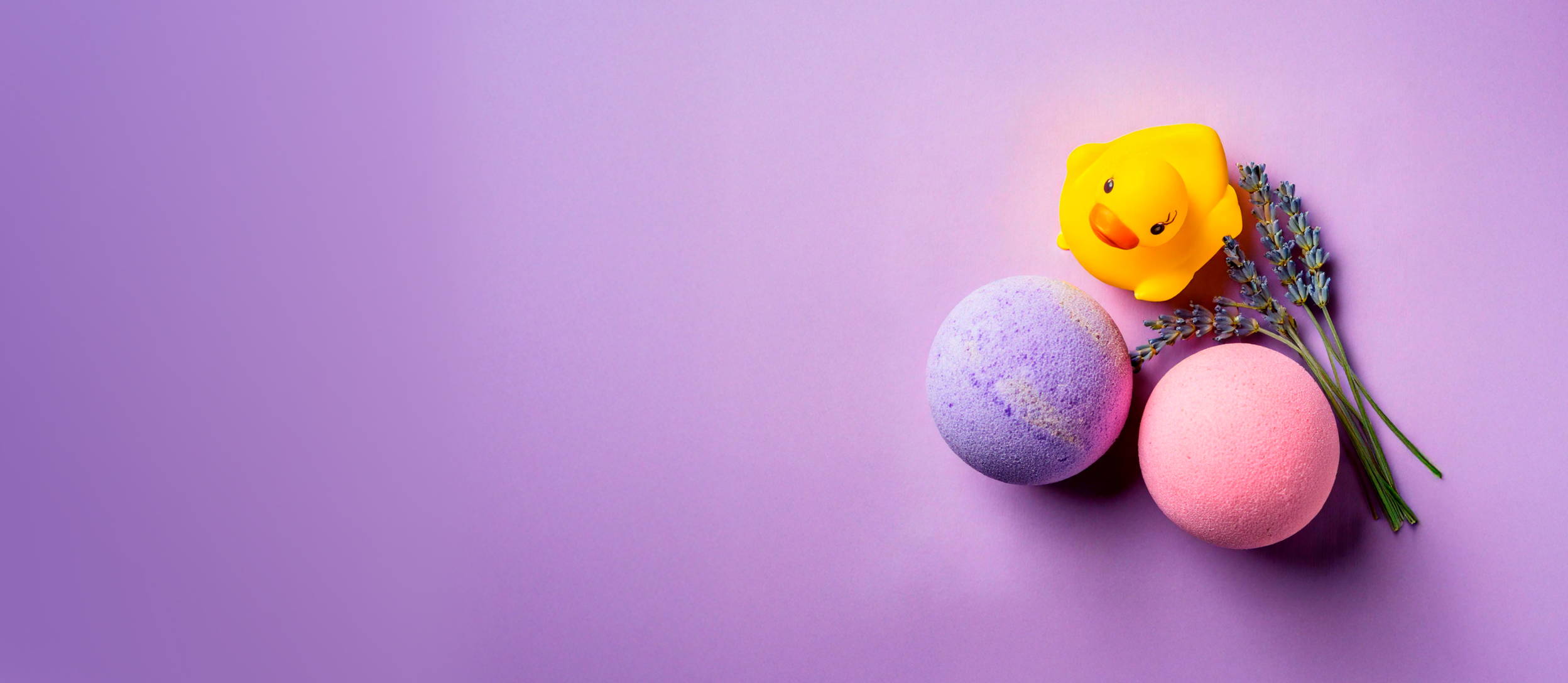 Pink and purple bath bombs, lavender, and rubber duck (large)