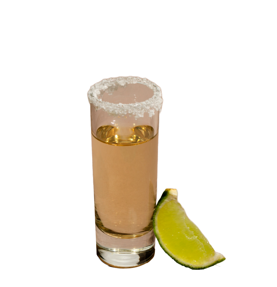 Tequila shot glass rimmed with salt and a lime wedge
