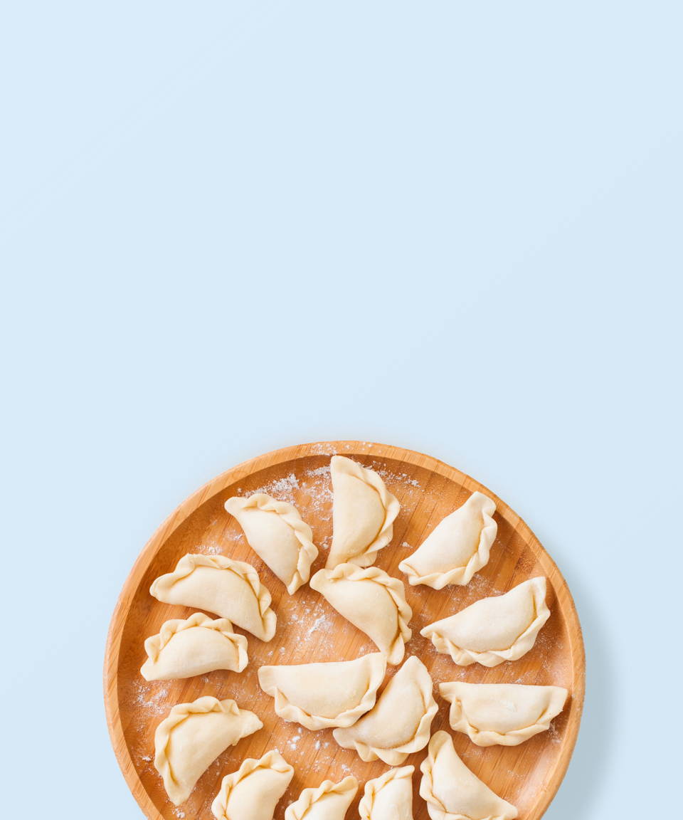 Crimped hand pies arranged on a big plate for Confetti's Virtual Hand Pie Baking Class
