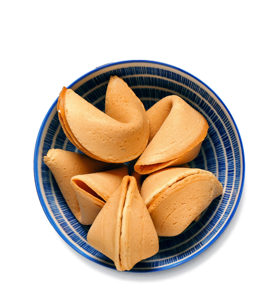 Fortune cookies in a porcelain bowl