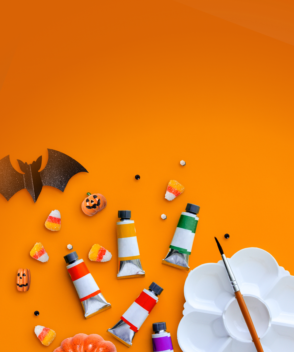 Tubes of paint, palette, paintbrush, and Halloween decorations (small)