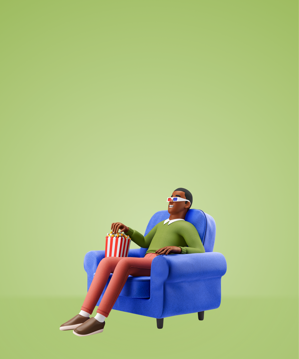 Man wearing 3D glasses and eating popcorn in an arm chair for Confetti's History of Black Cinema Class (Small)