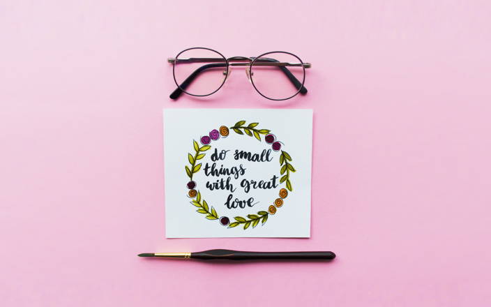 Glasses, a pen, and a card from a BYO Hand Lettering Class (preview)